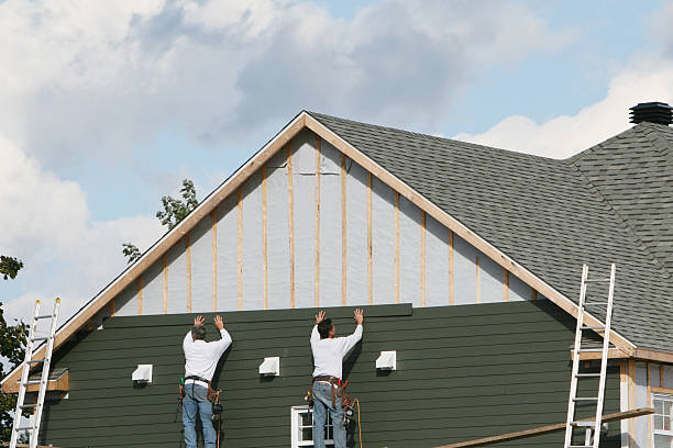 Professional Siding Installation technician working in North Fairfield, OH